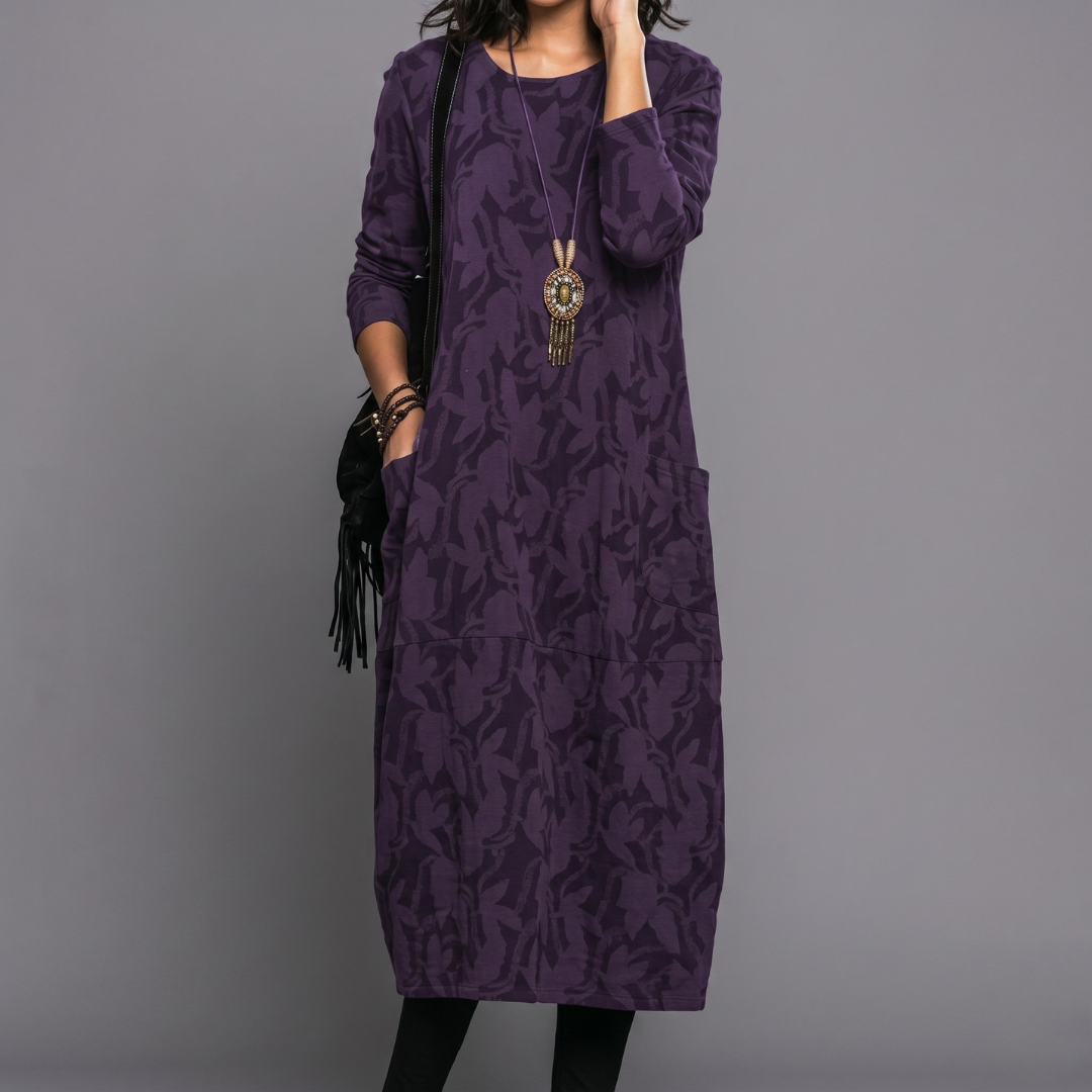 Purple long sleeve midi dress with subtle leaf pattern and comfortable fit