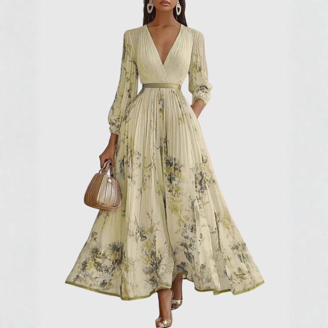Pale yellow-green pleated midi dress with olive waistband and floral motif