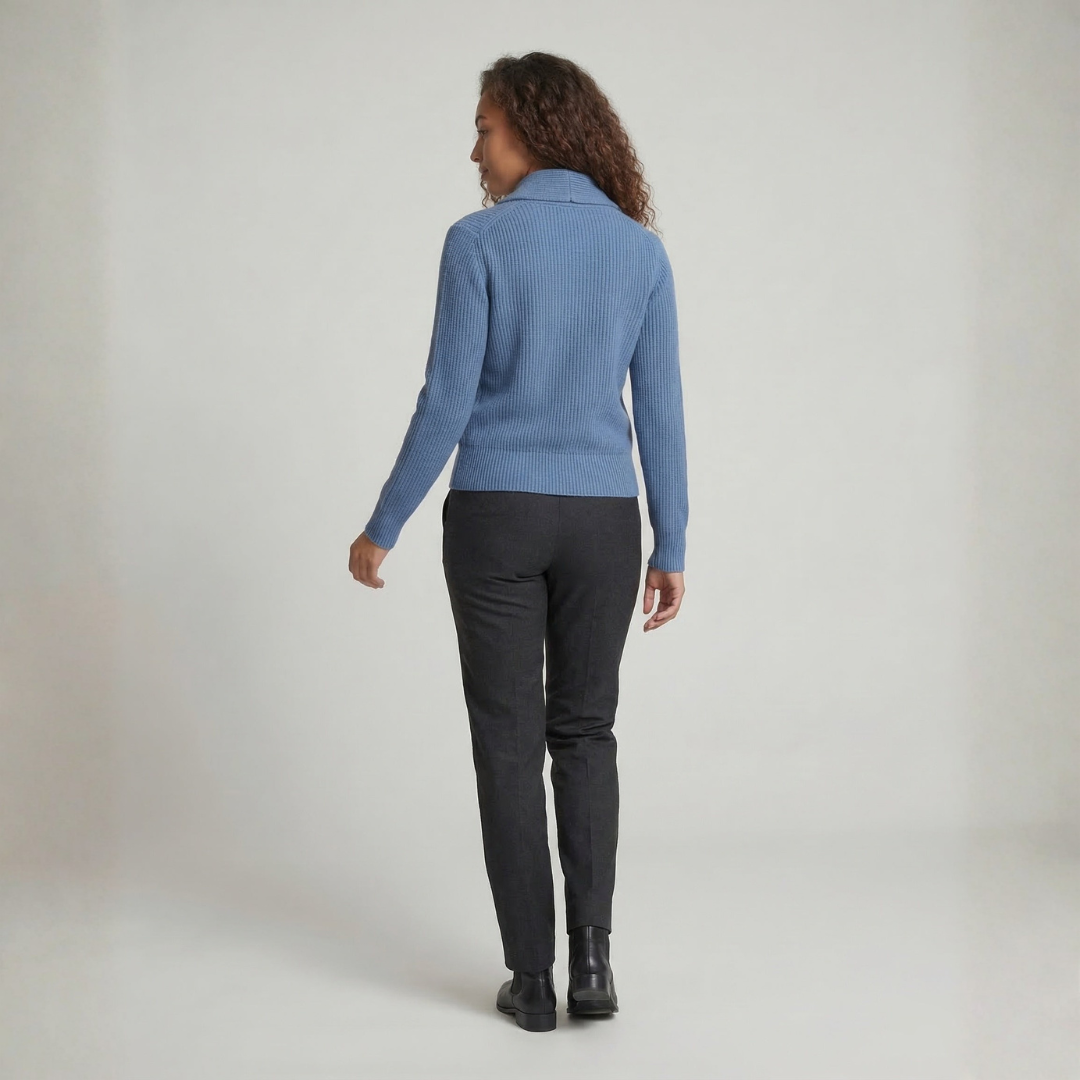 Back view of light blue lapel cardigan showing button closure fit