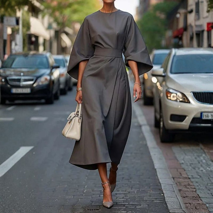 Gray batwing sleeve midi dress with draped asymmetrical hem and belted waist