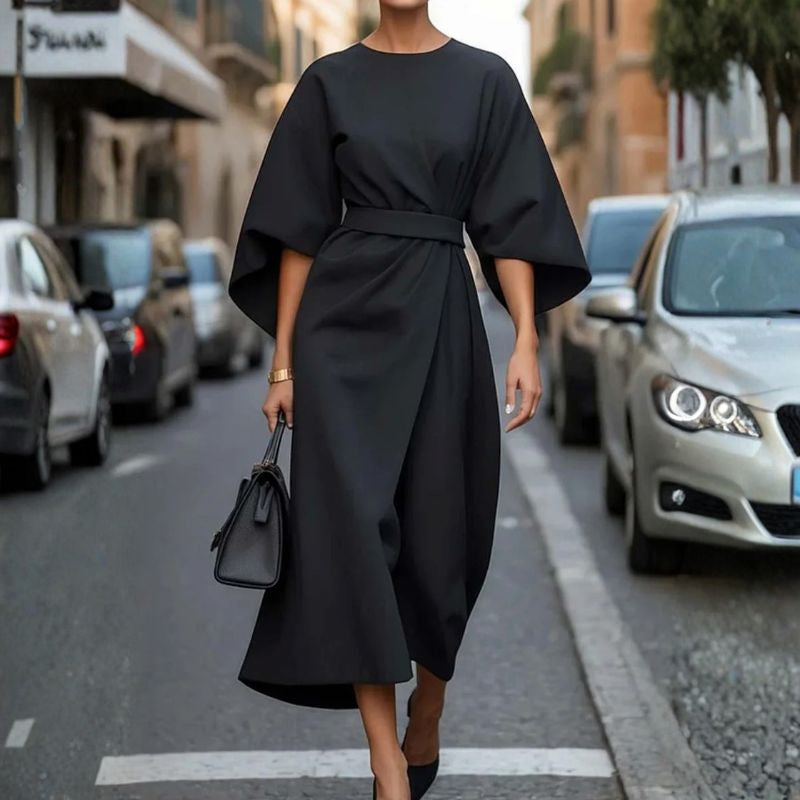 Black modest batwing midi dress featuring round neck and matching fabric belt