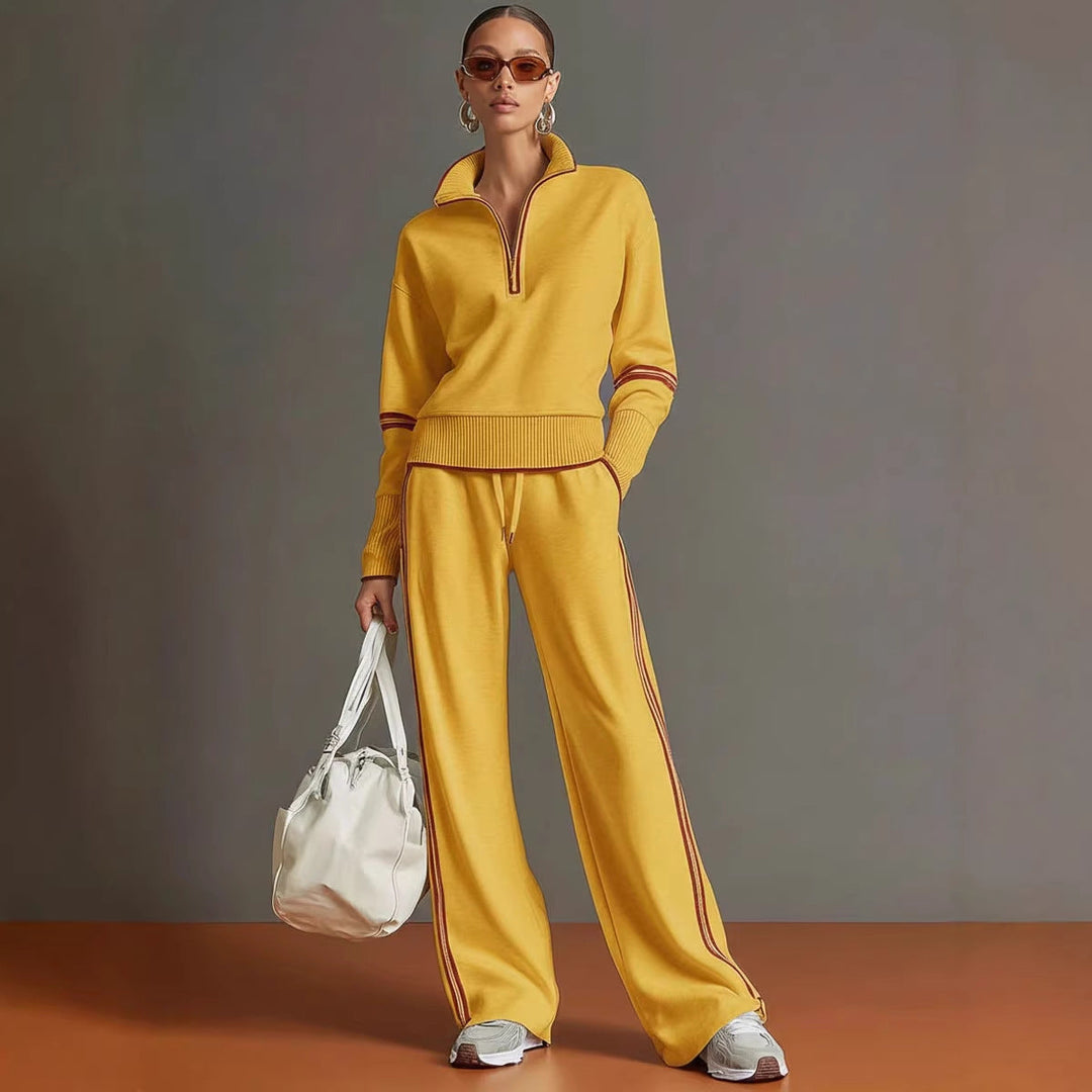 Mustard yellow women's casual two-piece tracksuit with quarter-zip top and wide-leg joggers