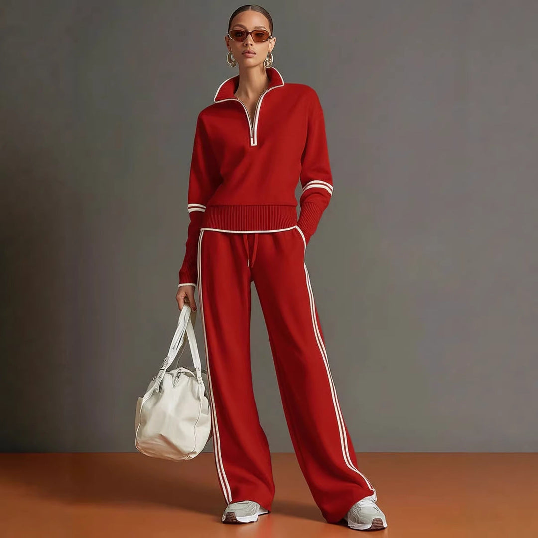 Vibrant red women's matching sports set with quarter-zip top and drawstring wide-leg joggers