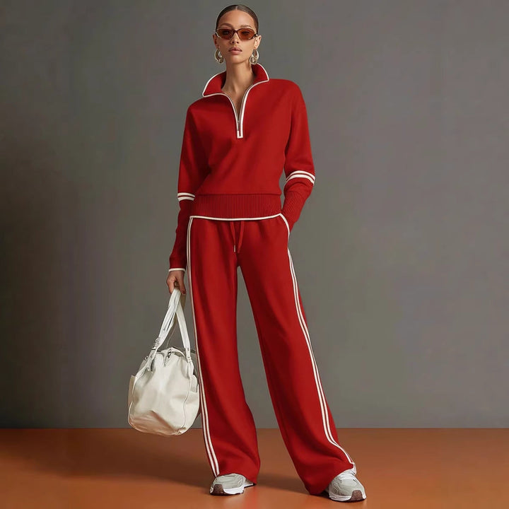 Vibrant red women's matching sports set with quarter-zip top and drawstring wide-leg joggers