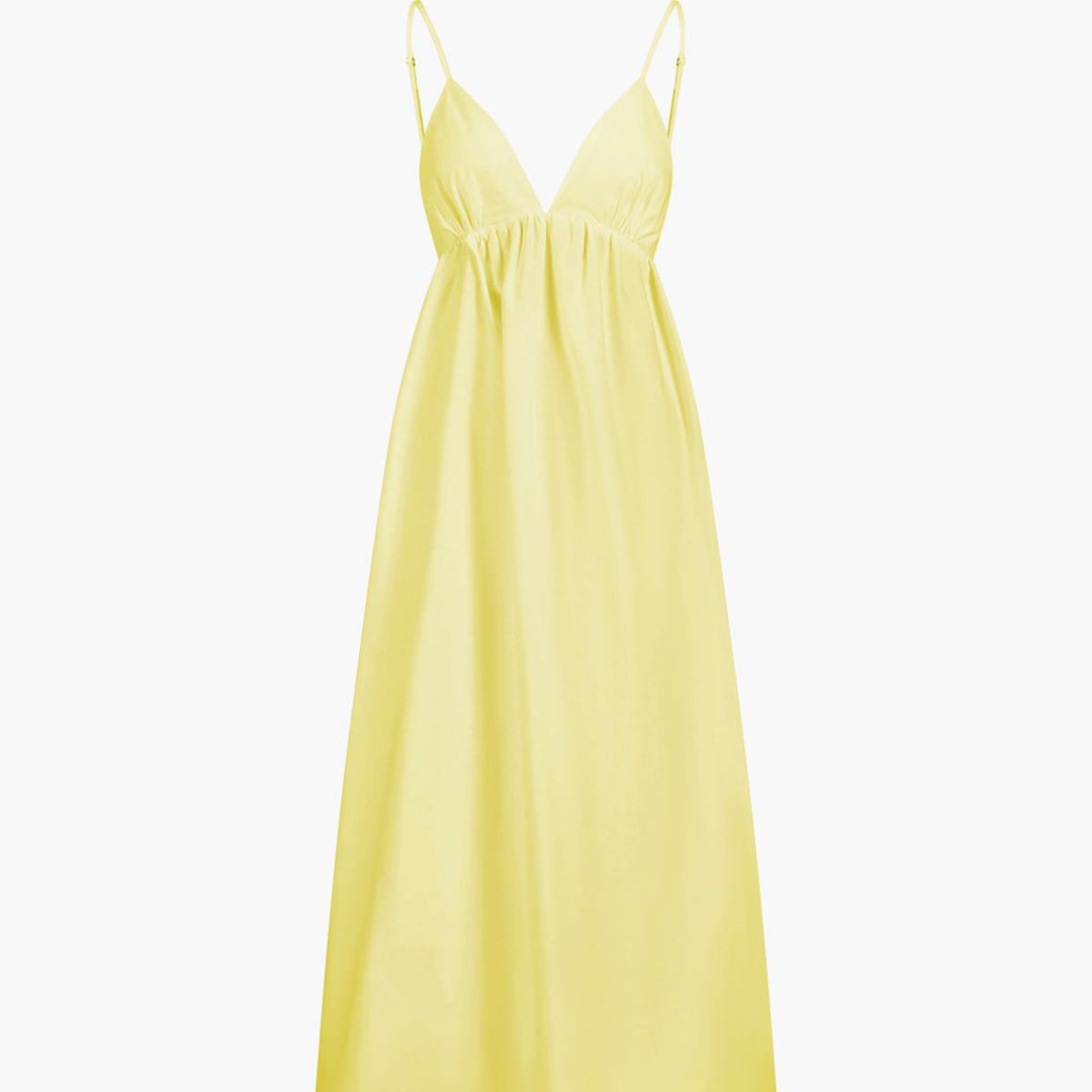 Pale yellow sleeveless A-line maxi dress with deep V-neck and summer style