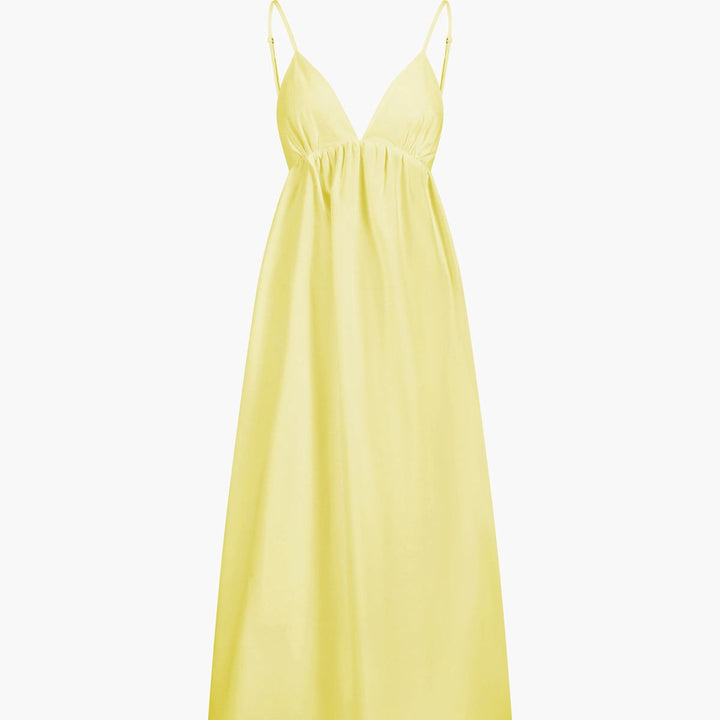 Pale yellow sleeveless A-line maxi dress with deep V-neck and summer style