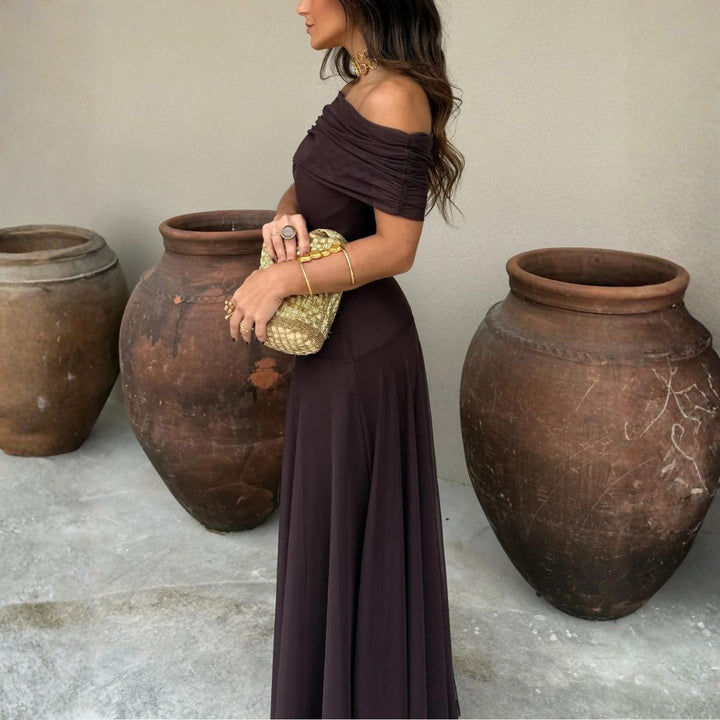 Full profile of dark brown one-shoulder chiffon maxi dress with asymmetrical drape