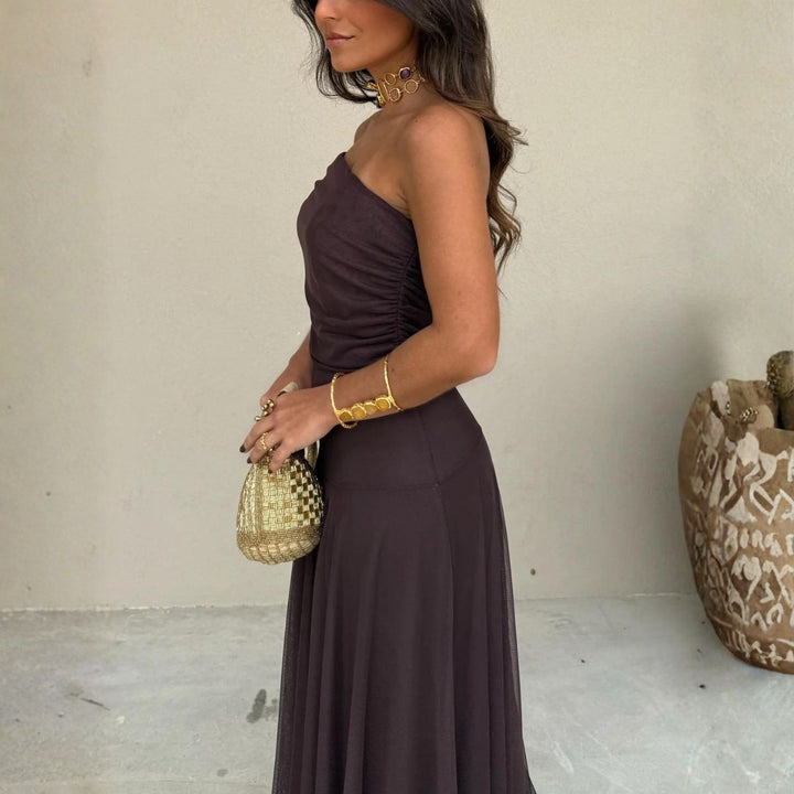 Dark brown off-shoulder maxi dress featuring high-waisted pleated skirt design