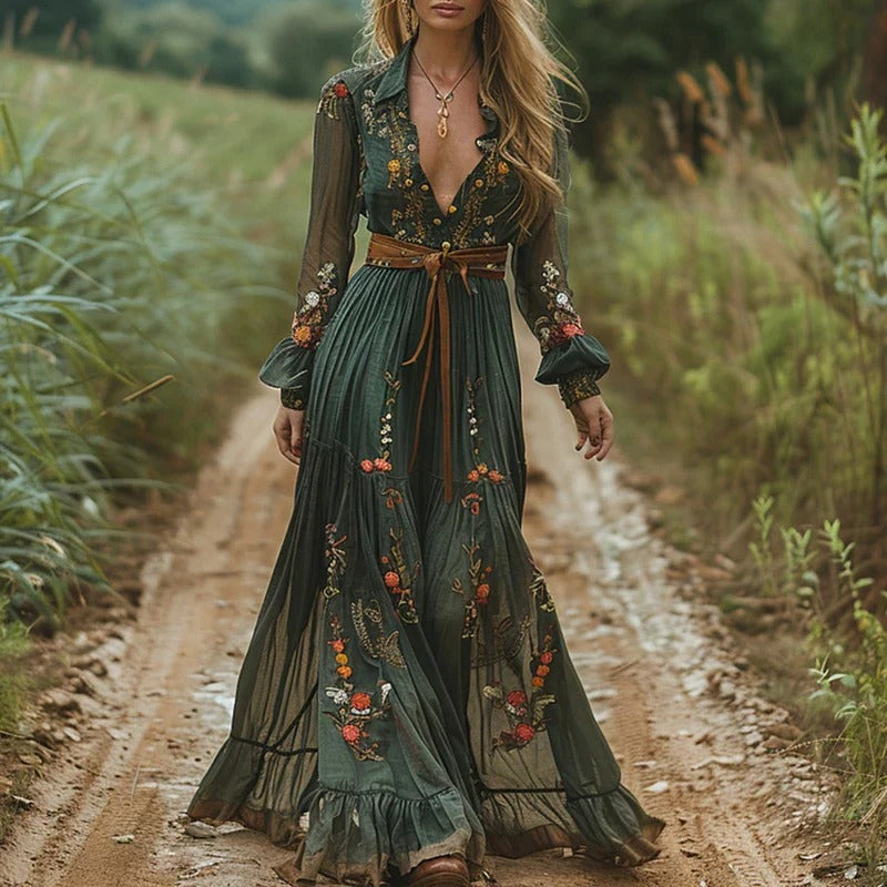 Dark green bohemian gown with intricate gold and orange botanical embroidery