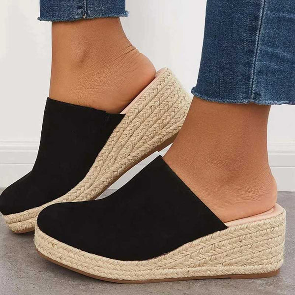 Black suede closed-toe espadrille wedge mules with woven jute platform