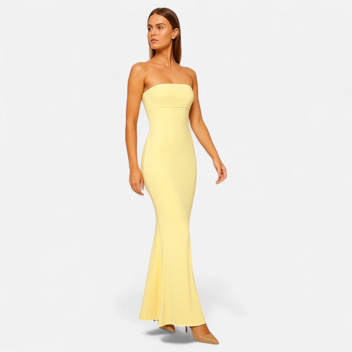 pale yellow strapless mermaid hem evening gown side view