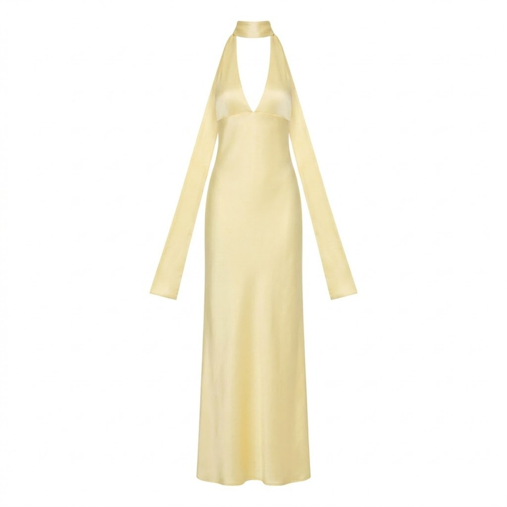 Pale yellow halter neck maxi gown with deep V-plunge neckline