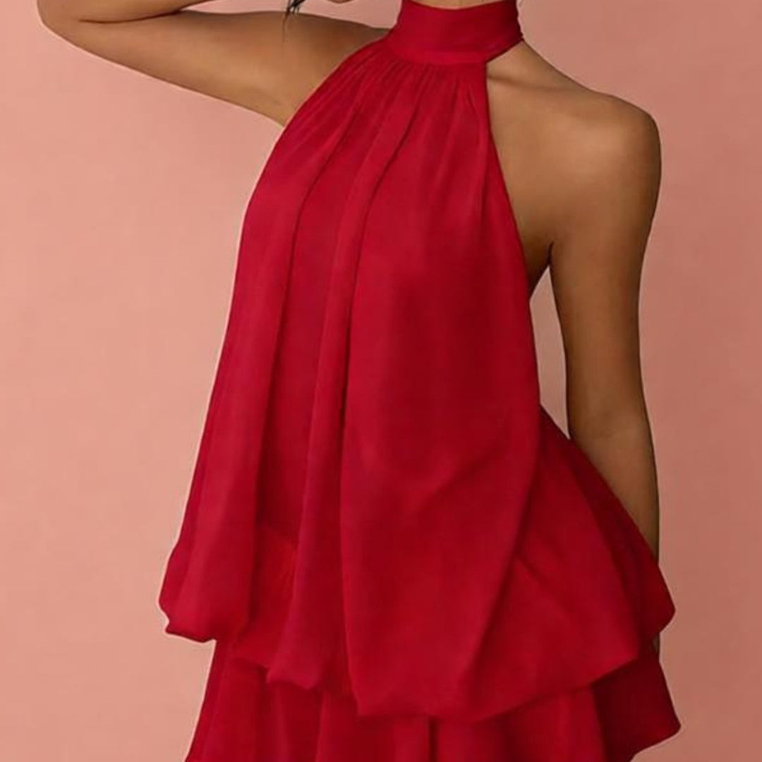 Vibrant red halter neck mini dress front view with high neckline and ruffled hem