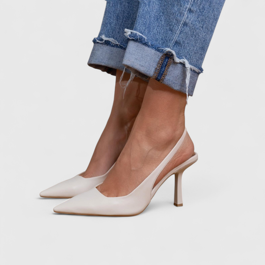 Cream glossy pointed toe slingback pumps with stiletto heel and synthetic leather