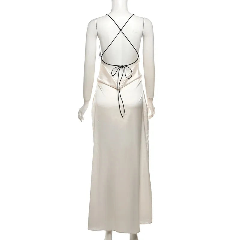 Rear view of champagne satin slip dress with crisscross strap back design