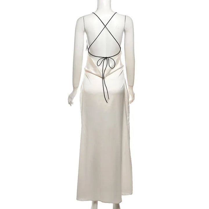 Rear view of champagne satin slip dress with crisscross strap back design