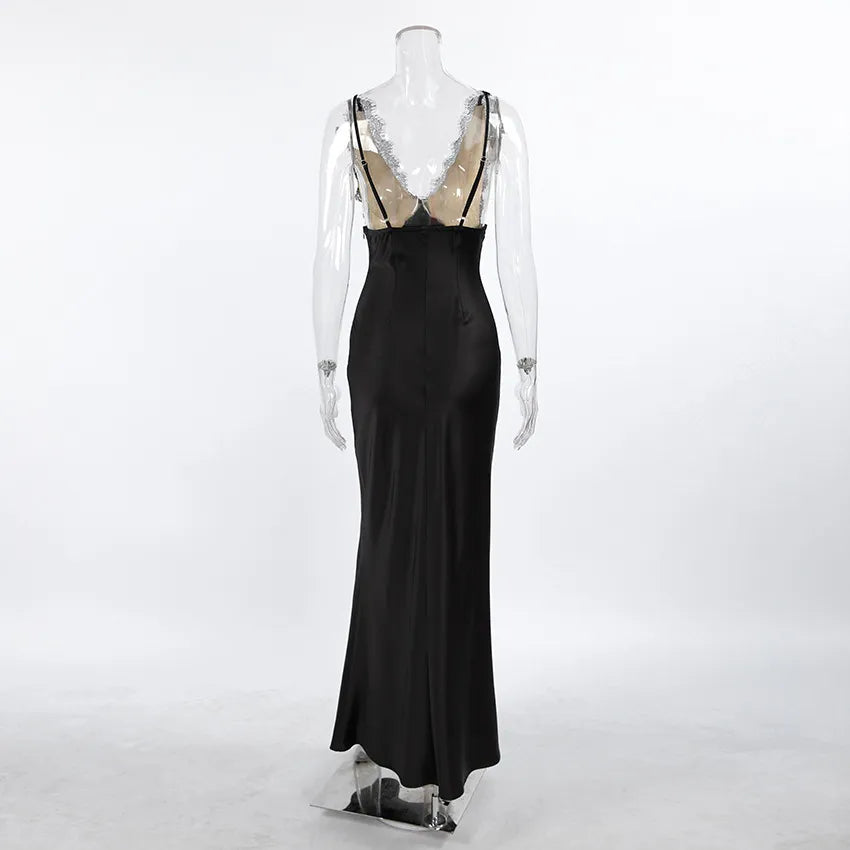 Black satin mermaid silhouette gown with lace-trimmed bust and cross-back straps