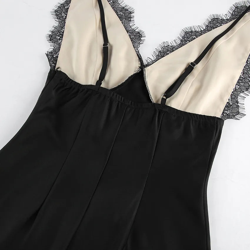 Black eyelash lace trim detail on champagne satin back neckline of slip dress