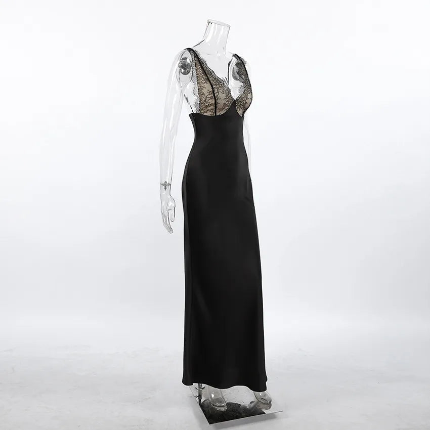 Black satin slip dress with deep V-neckline and intricate eyelash lace trim