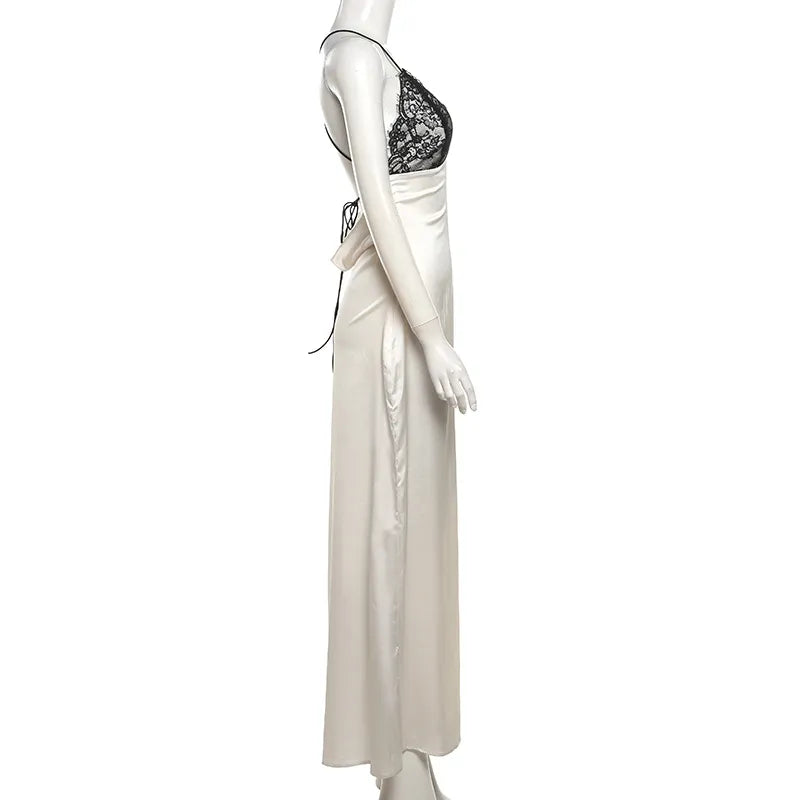 Side view of bias cut champagne satin maxi dress with black lace bodice