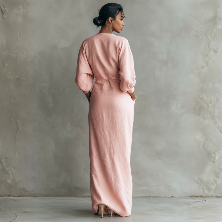 Blush pink linen wrap maxi dress back view with draped waist and three-quarter sleeves