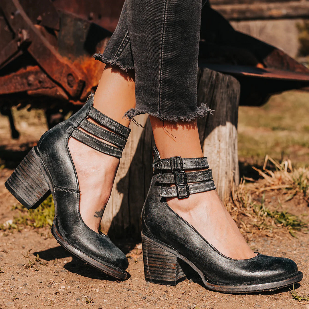 Black distressed leather ankle strap block heels with wood grain heel