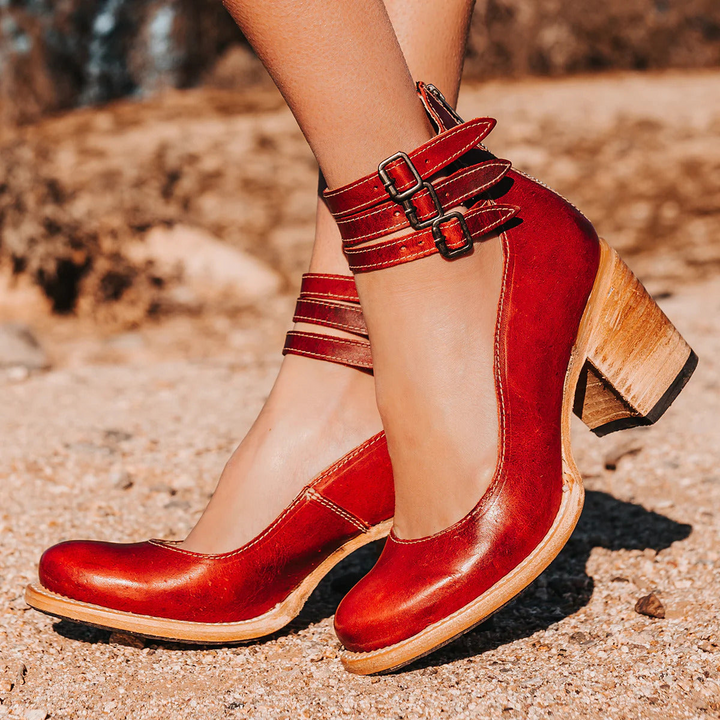 Red polished leather multi-strap block heels with white stitching