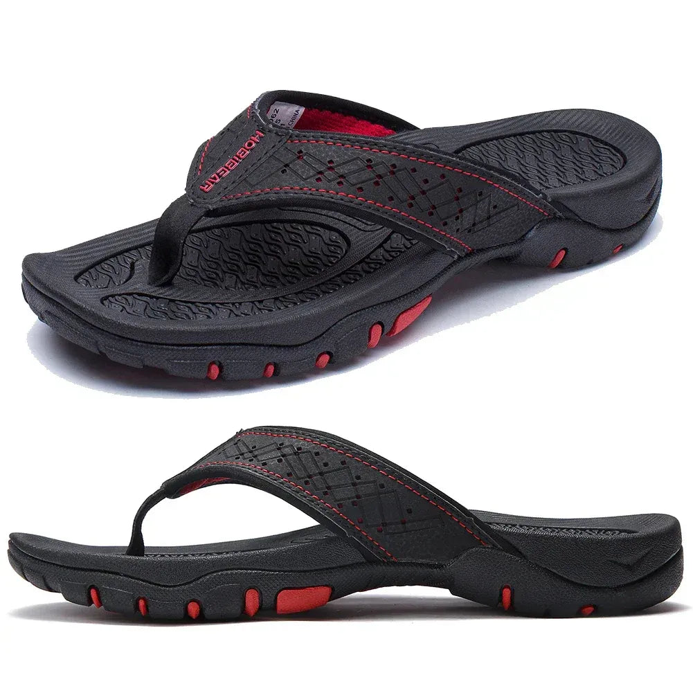 Black HOBEIBEAR men's flip flops with red stitching and rubber lug outsole