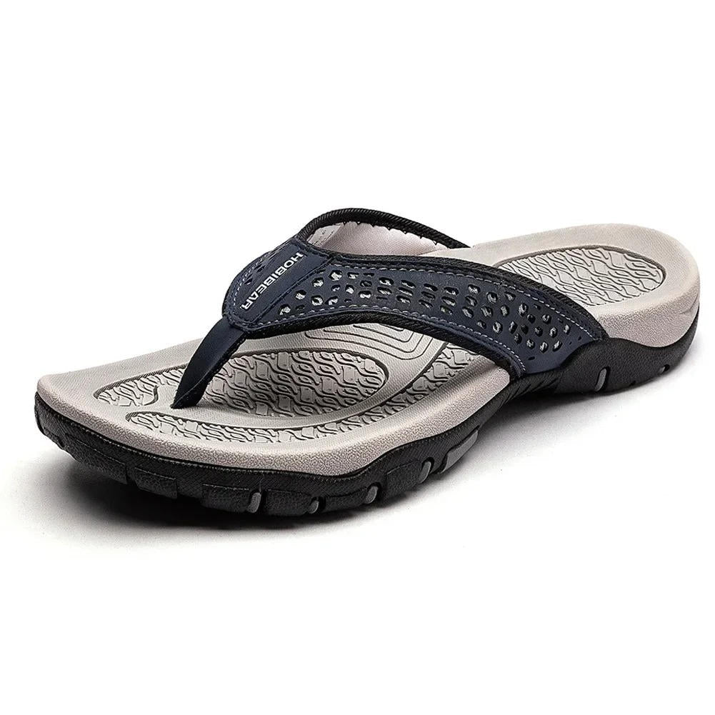 Navy blue MOBIEAR men's sandals with gray leaf-textured footbed and white logo
