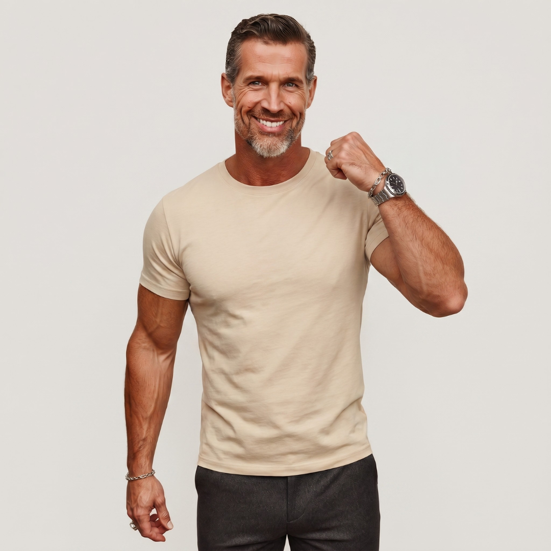 Close-up of men's beige crew neck t-shirt showing slightly fitted silhouette and short sleeves