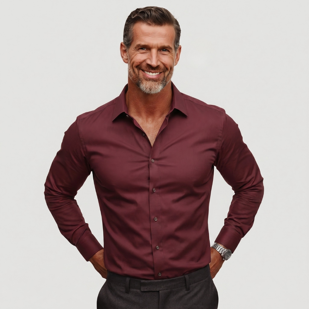 Burgundy slim fit men's non-iron shirt emphasizing tailored silhouette