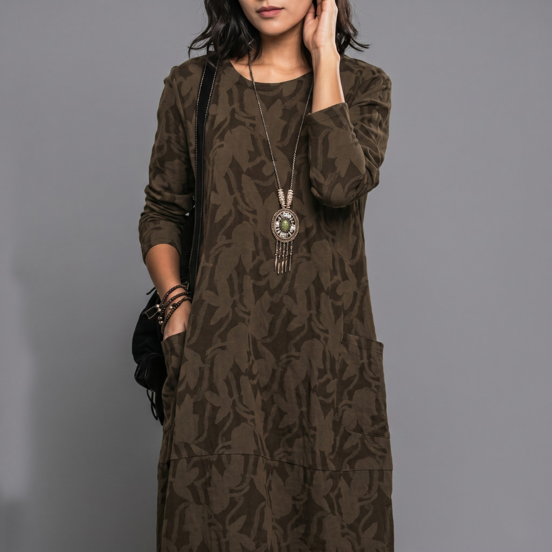 Brown casual midi dress featuring crew neck, loose fit, and hidden pockets
