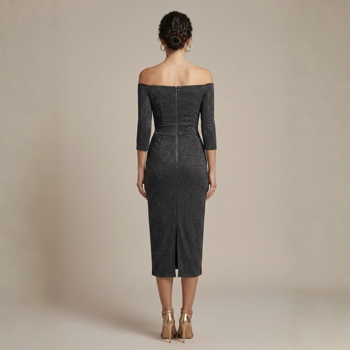 Back view of charcoal glitter midi dress revealing center zipper and fitted waist