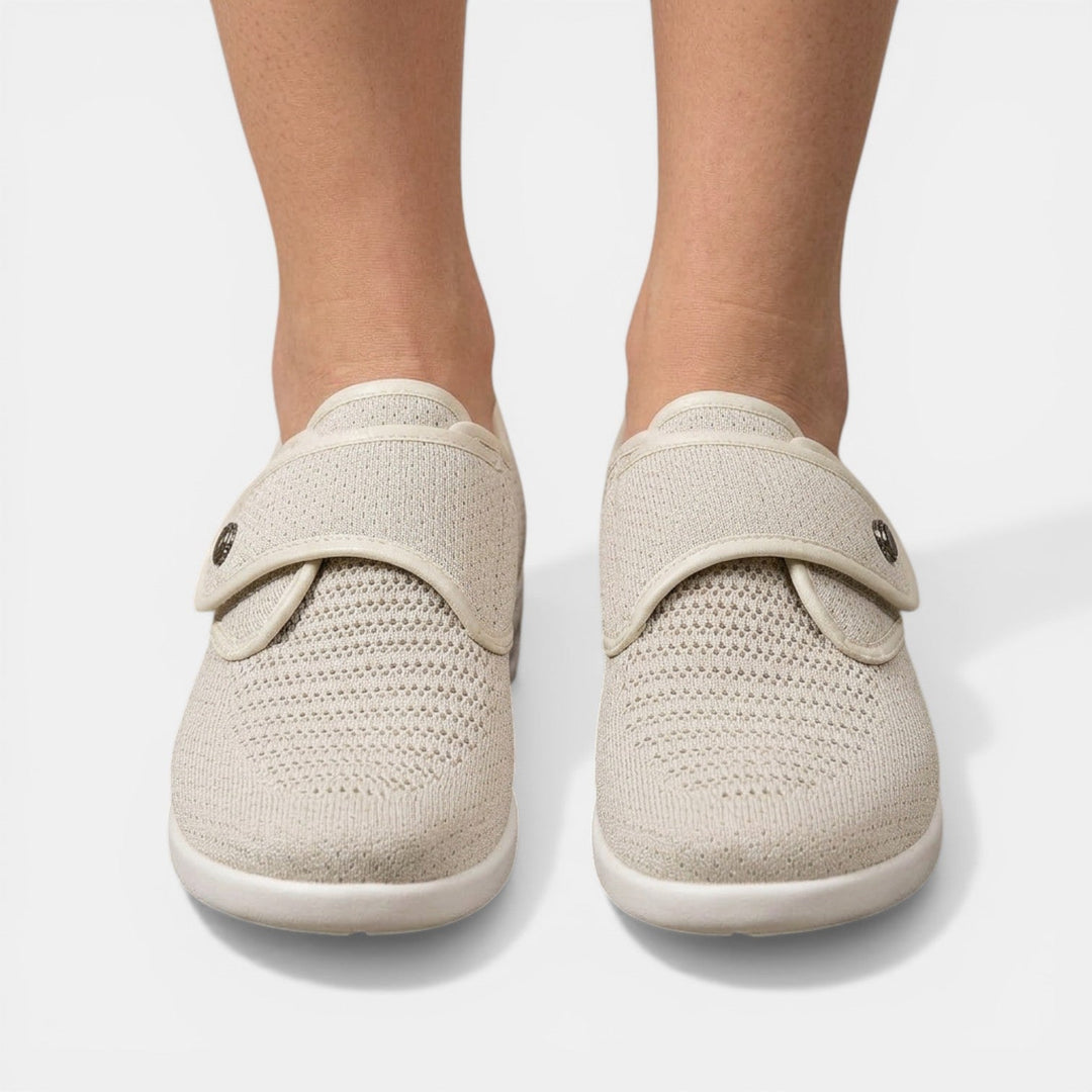 Light beige knitted mesh orthopedic sneakers front view with matching velcro strap