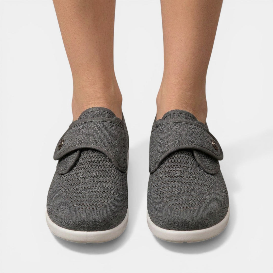 Front view of gray textured orthopedic walking shoes with symmetrical hook loop fastener