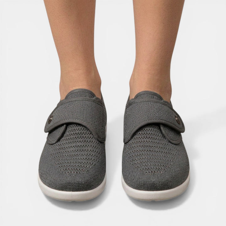 Front view of gray textured orthopedic walking shoes with symmetrical hook loop fastener