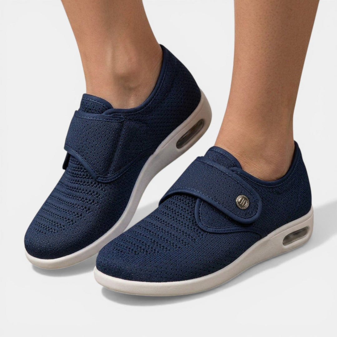 Dark navy orthopedic walking sneaker with velcro strap and air cushion sole