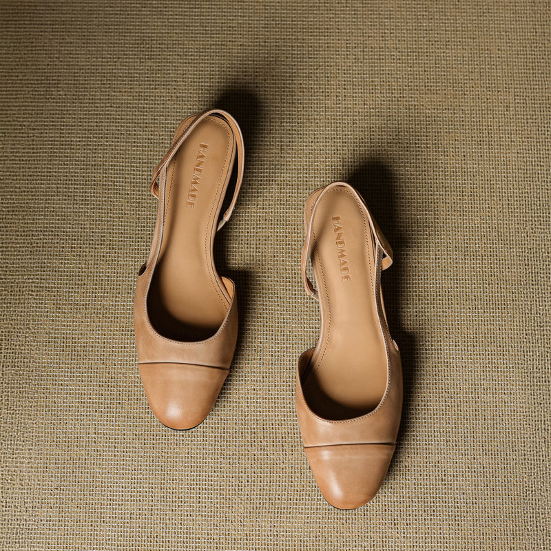 Tan leather slingback pumps overhead view with smooth finish and stitching