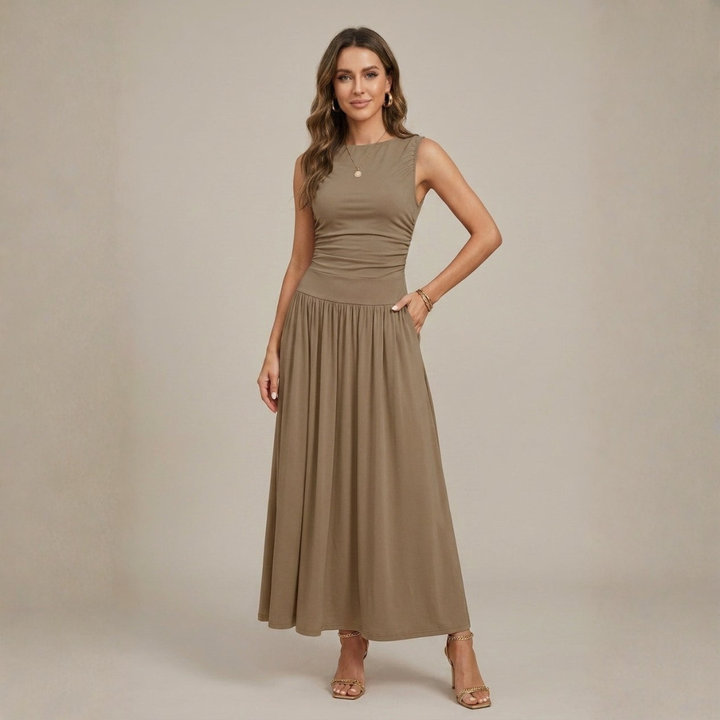 Olive green flowy maxi dress with round neckline and pockets