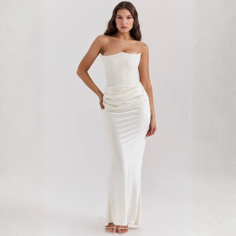 White strapless corset satin maxi dress featuring fitted bodice and ruched waist