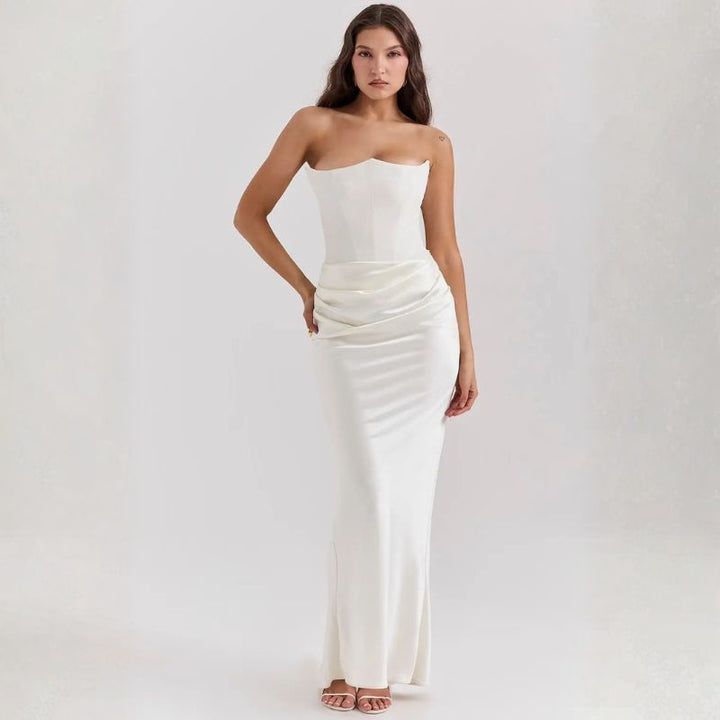 White strapless corset satin maxi dress featuring fitted bodice and ruched waist