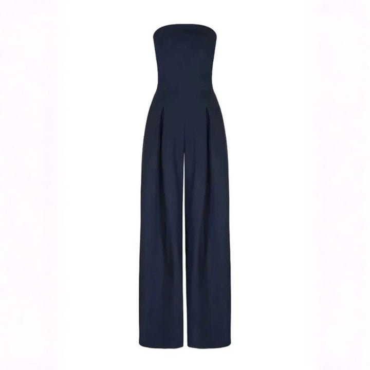 Flat lay navy blue strapless jumpsuit showing vertical front pleat details