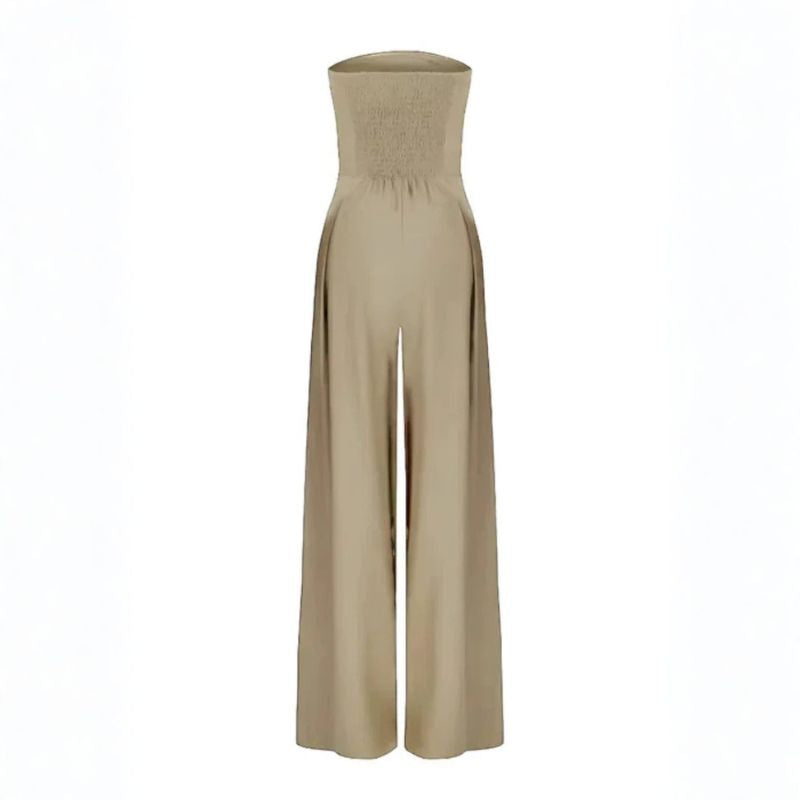 Back view of beige strapless jumpsuit with smocked elasticized bodice panel
