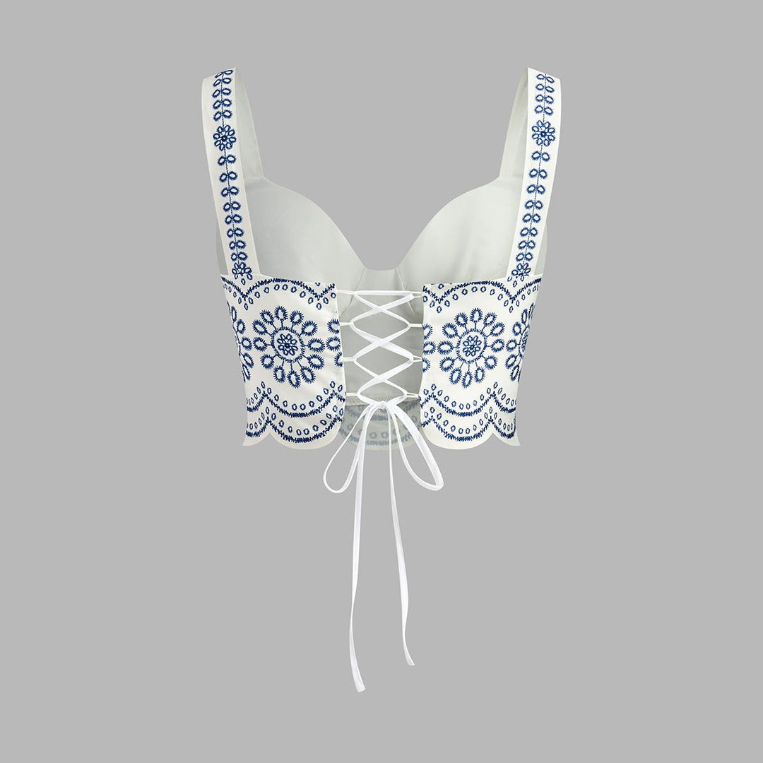 Back view of white bustier crop top with lace-up tie closure