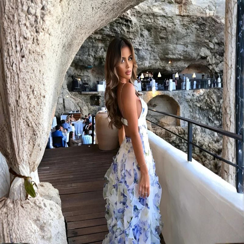 Backless floral print maxi dress with cutout detail and voluminous ruffled skirt