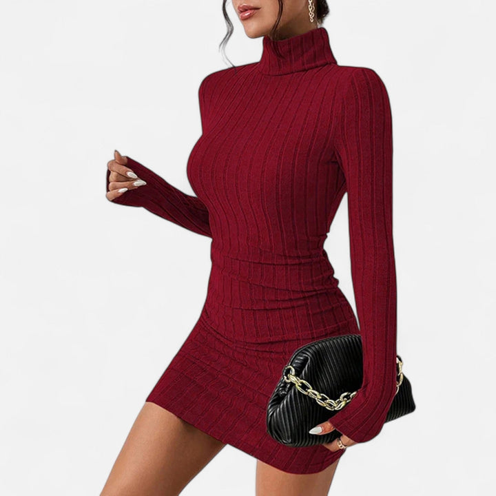 Deep red ribbed knit mini dress side profile accentuating waist