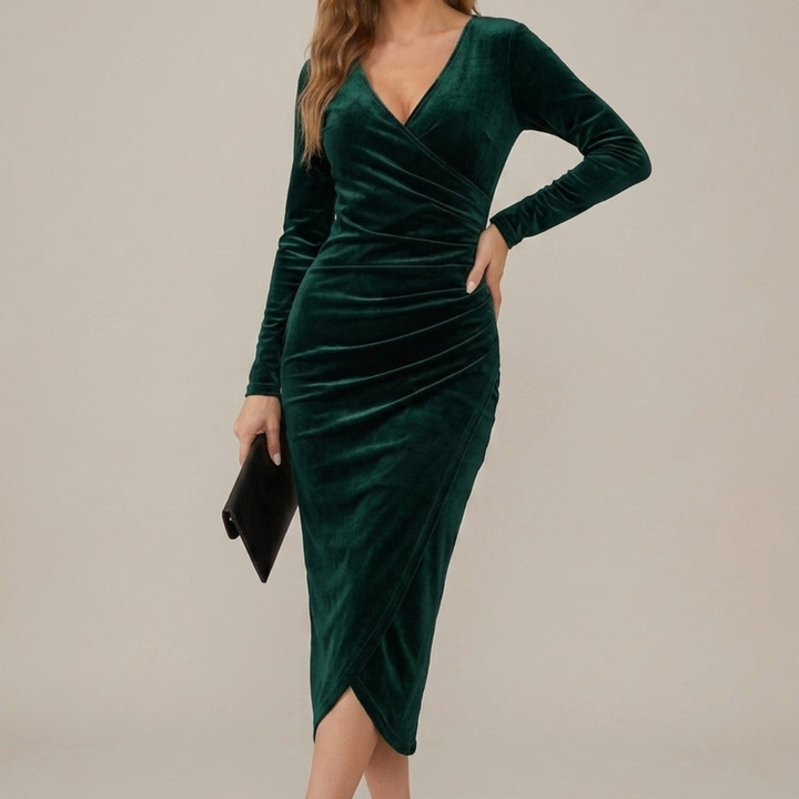 Deep green velvet wrap midi dress featuring ruched bodice and sheath skirt