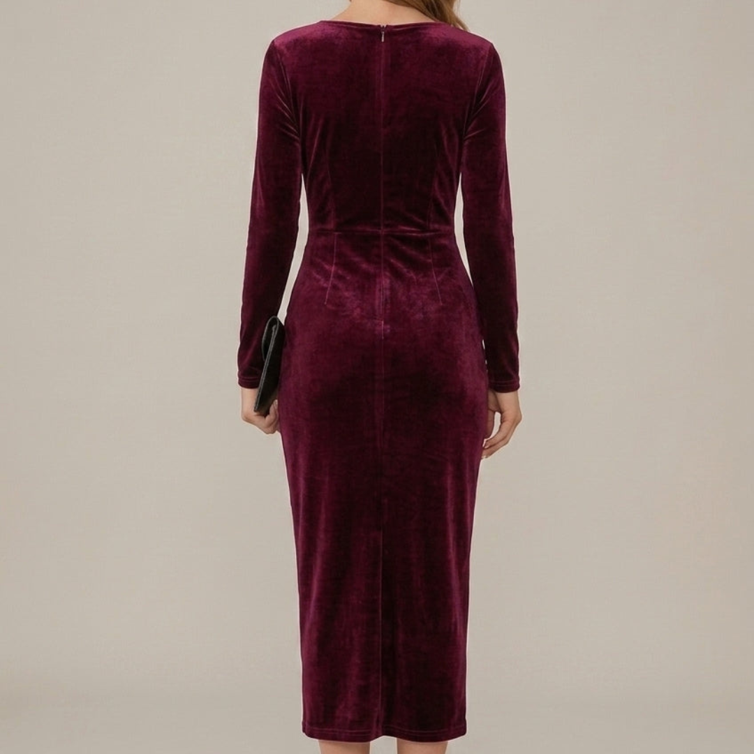 Back view of burgundy velvet wrap dress showing zipper closure