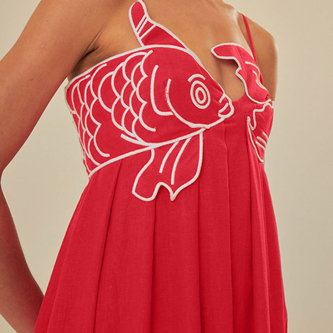 Red cotton polyester blend cami dress with detailed sculpted fish appliqué close-up