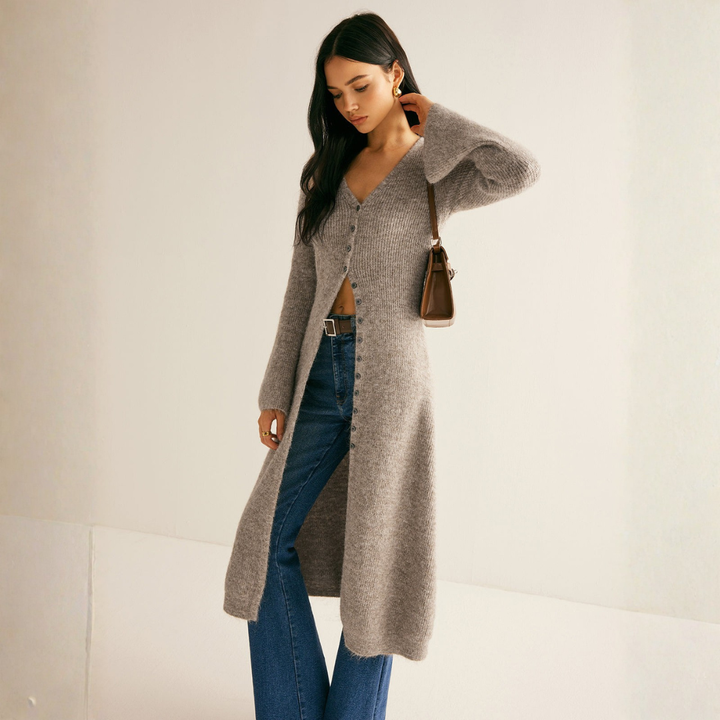 Heather gray button-front ribbed duster sweater layered over jeans